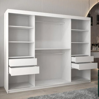 Open drawers and shelves of Eden wardrobe highlighting white matte finish and smooth glide drawers.