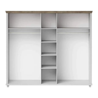 The CHOICEWARDROBE Eilat 246cm 5 Door Mirrored Wardrobe in Abisko Ash features a classic panel design, two hanging rails per side, five central shelves, and a light wood top. Shown empty against a plain background.