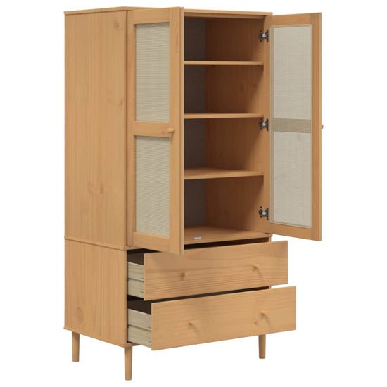 Natural pine wooden wardrobe with rattan doors and two drawers, open to reveal shelves