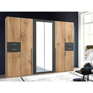 Oak and graphite 6 door mirrored wardrobe with drawers and hanging rails, combining warm wood tones with modern UK bedroom styling.