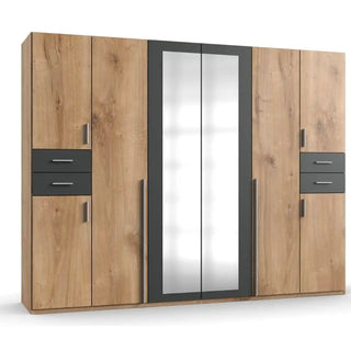 Detail view of Fenton oak wardrobe showing graphite handles, planked wood texture and reflective mirror panels for a premium modern finish.