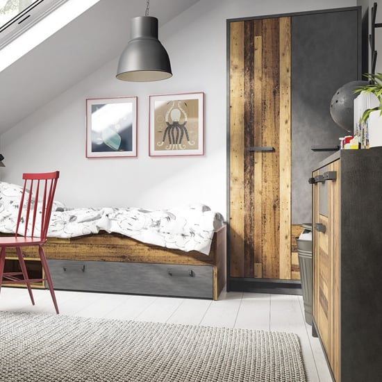 CHOICEWARDROBE Ferro 2 door 2 drawer wardrobe in rustic walnut & graphite finish in a bedroom setting.