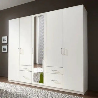 White 5 door mirrored wardrobe with drawers and shelves, crafted for bright modern UK bedrooms offering style and functional storage.