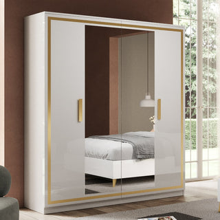 The CHOICEWARDROBE Geneva High Gloss Mirrored Wardrobe (164cm, White & Gold Finish) with full mirror and luxury sliding doors reflects a neatly made bed with gray bedding, pendant lamp, and flowers in a naturally lit bedroom.