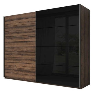 The CHOICEWARDROBE Glens 270cm 2 Door Sliding Wardrobe features a Monastery Oak finish with sleek black glass panels, combining modern design and functionality for stylish storage in any bedroom.