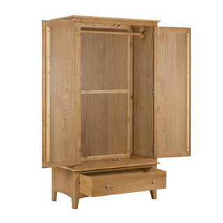 The CHOICEWARDROBE Halton 2 Door 1 Drawer Wardrobe in natural oak finish, with open doors revealing a hanging rod and a partially open drawer below, offers classic and stylish bedroom storage in a 100 cm design.