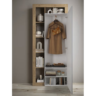 The CHOICEWARDROBE Hanmer 91cm Mirrored Single Door Wardrobe in Knotty Oak features an open white door displaying a brown dress and handbag, plus minimalist shelves with books, decor, and accessories for modern space-saving storage.