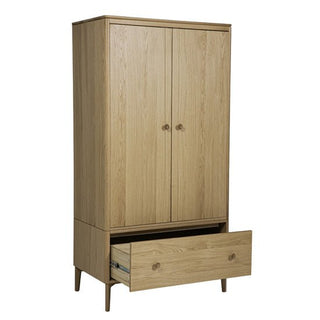 The CHOICEWARDROBE Hazel 2 Door Wooden Wardrobe in oak finish offers modern Scandinavian style with a single drawer and tapered legs—an ideal minimalist storage solution for bedrooms.