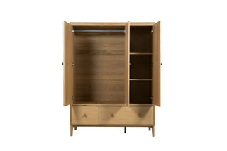 Interior of CHOICEWARDROBE Hazel natural oak 3 door wardrobe – hanging rail, shelving, and drawer storage layout