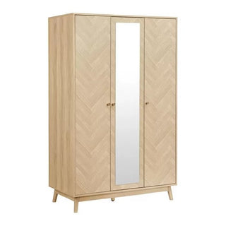 The CHOICEWARDROBE Helena 3 Door Mirrored Wardrobe features an oak chevron finish, a central full-length mirror, round knobs on each door, and stands on four wooden angled legs.