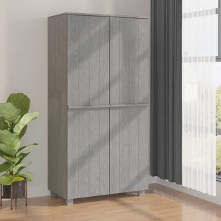The CHOICEWARDROBE Hull 4 Door Wardrobe—89 cm, light grey oak effect—offers tall, modern bedroom storage with split compartments. Perfect for rooms with wood flooring and natural light, it suits a contemporary space next to plants and windows.