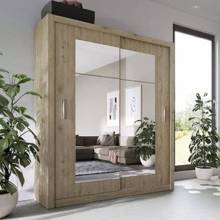 The CHOICEWARDROBE Ionia 2 Door Mirrored Sliding Wardrobe (180cm, Sonoma Oak Finish) features elegant modern design, full-length mirrors, smooth sliding doors, and spacious organised storage—ideal for stylish bedroom organization.