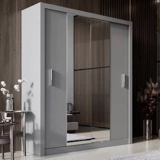 The CHOICEWARDROBE Ionia 2 Door Sliding Mirrored Wardrobe in matt grey adds modern style and storage to contemporary bedrooms, featuring shelves and a hanging rail for space-saving organization.