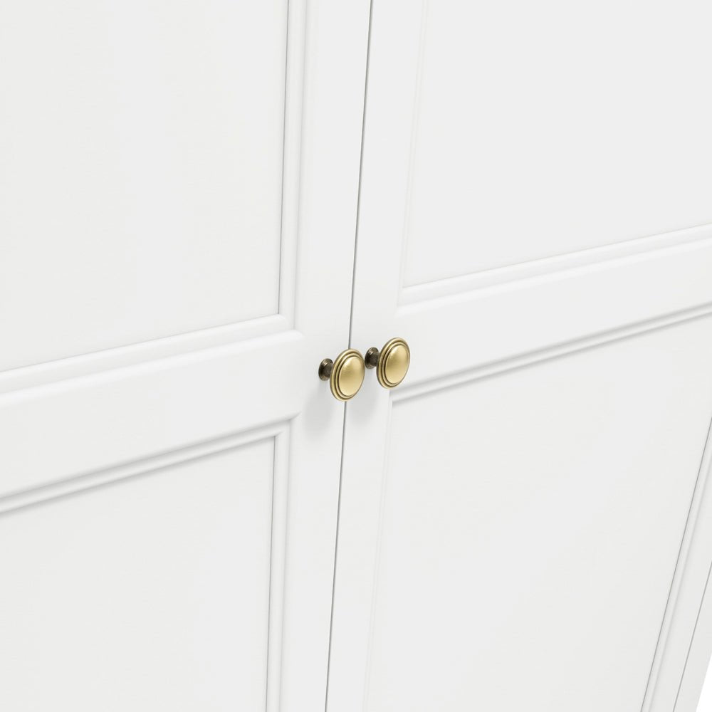 White 2-door wardrobe detail with gold oval handles