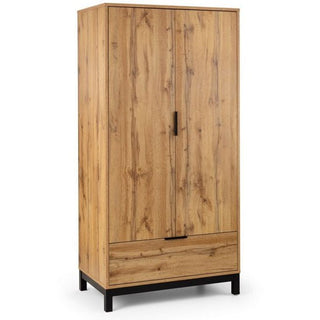The CHOICEWARDROBE Kairo 2 Door 1 Drawer Wardrobe features a rustic oak finish, black handles and legs, plus industrial style. Its compact design offers modern bedroom storage with vertical doors and a lower drawer.