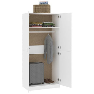 The CHOICEWARDROBE Kaylor White Wooden 2 Door Wardrobe is shown with both doors open, revealing shelves holding folded clothes, a wheeled suitcase, shoes, a hanging shirt, and a wicker basket with magazines on top.