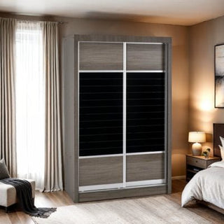 ChoiceWardrobe Laggan 2 door sliding wardrobe in grey oak with black glass panels, styled in a modern bedroom.