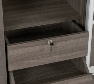 Close-up of drawer section on Laggan sliding wardrobe showing lockable drawer and wood grain texture.
