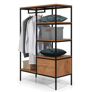 The CHOICEWARDROBE Logan Open Wardrobe features a Lancelot Oak finish, black metal frame, shelves, and drawers in an industrial style—ideal for hanging clothes, plus storage for pillows and boxes on the bottom shelf.