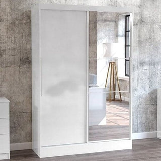 ChoiceWardrobe Lynn 132cm White Sliding Door Mirrored Wardrobe with modern minimalist design, styled in a contemporary bedroom.