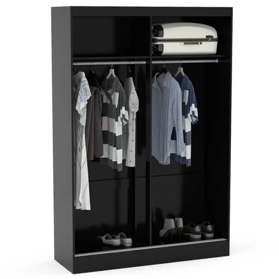 High gloss black wardrobe interior with mirrored sliding doors, hanging rail, and top shelf
