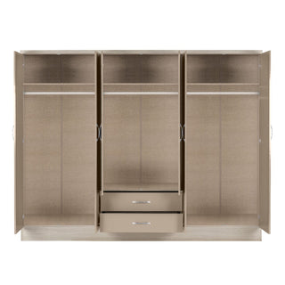 Internal layout of Mack 230cm wardrobe – shelves, hanging rails and central drawers in sonoma oak finish