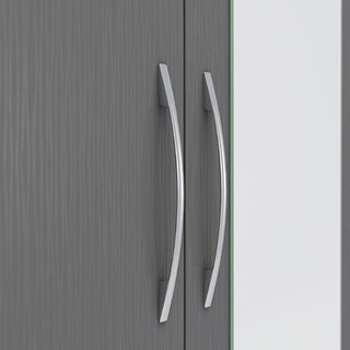 Close-up of two silver handles on the CHOICEWARDROBE Mack 78cm 2 Door Mirrored Wooden Wardrobe in grey finish, featuring a wood-like texture, drawer and hanging rail storage—perfect for bedroom organization. White surface visible to the right.