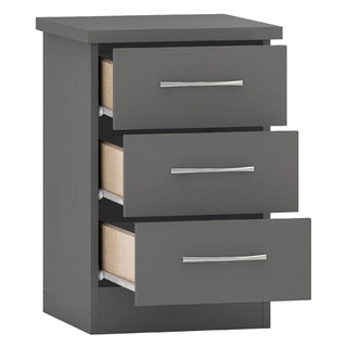 The CHOICEWARDROBE Mack Grey Wooden Bedroom Set features a modern design with sleek silver handles, including a 3-drawer chest in dark gray wood that complements any contemporary bedroom. The 4-piece set includes a wardrobe, drawers, and two bedside tables.
