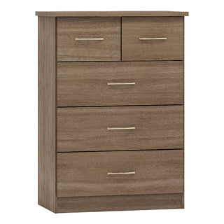 The CHOICEWARDROBE Mack Oak Wooden Chest of Drawers, part of a 4-piece bedroom set, features a modern oak finish with sleek handles and offers ample storage in a stylish, contemporary design.