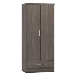 The CHOICEWARDROBE Mack Wardrobe is a tall, rectangular storage unit with a black woodgrain finish, featuring two doors with silver handles and a single pull-out drawer at the bottom.