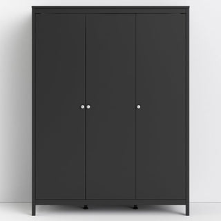 The CHOICEWARDROBE Macron 150 cm Black Wooden 3 Door Wardrobe with hanging rail and shelves provides modern, stylish bedroom storage against a white wall on a light gray floor.