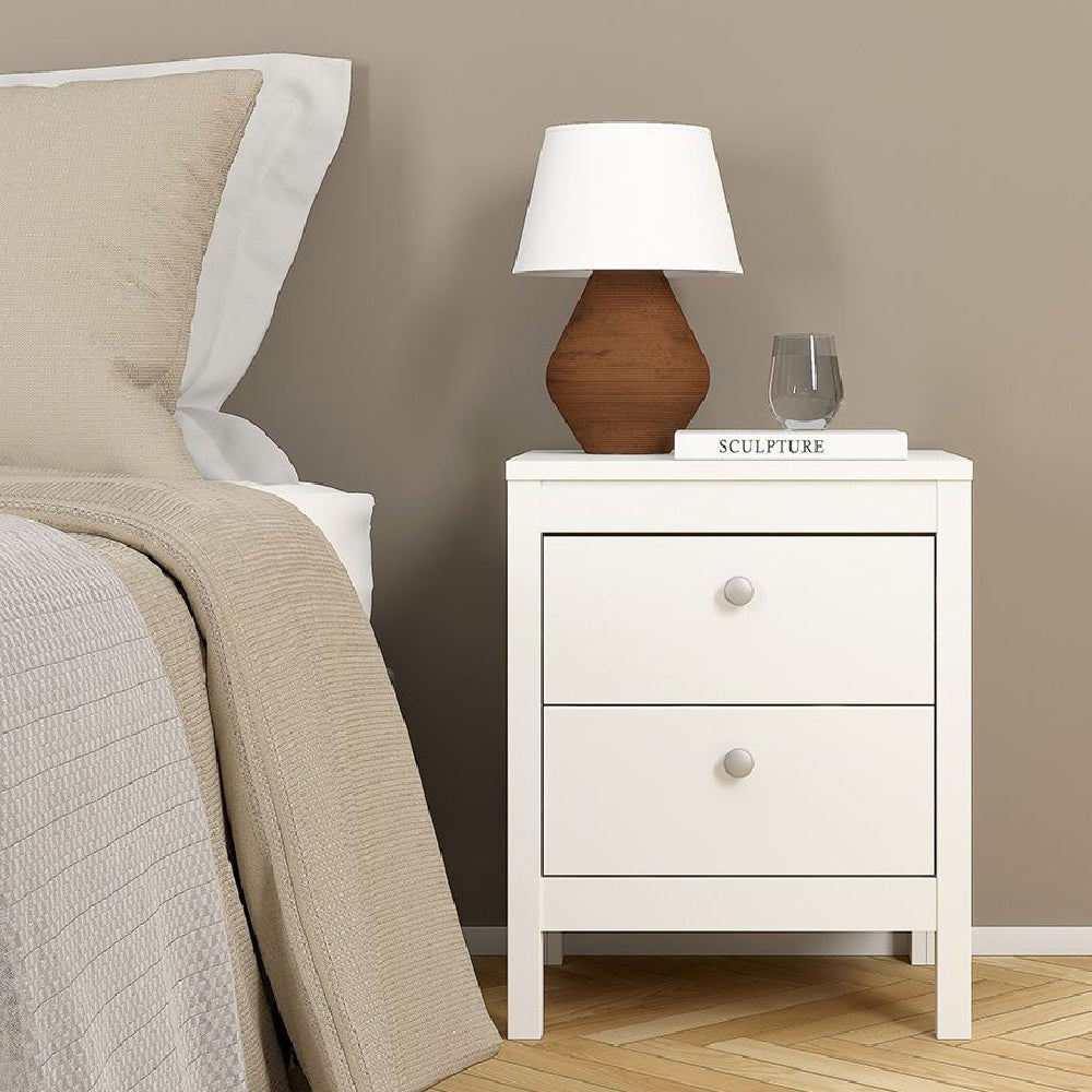 White bedside table with drawers, modern bedroom furniture, nightstand with lamp