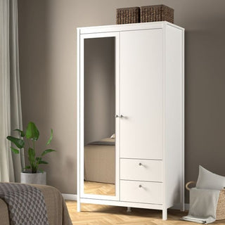 The CHOICEWARDROBE Macron White 2 Door Mirrored Wardrobe features a wooden frame, full-length mirrored door, two drawers below, and offers stylish bedroom storage—ideal for rooms with beige walls and wooden flooring.