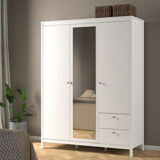 The CHOICEWARDROBE Macron White Mirrored Wardrobe features 3 doors, 2 right-side drawers, and a central mirror. Two woven baskets rest on top, a green potted plant stands to the left, and part of a bed appears in the foreground.