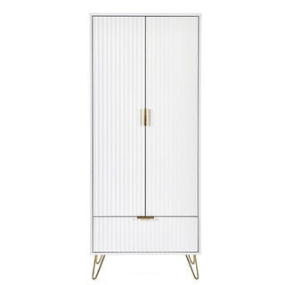 The CHOICEWARDROBE Marius Fluted 2 Door Wardrobe features a matt white finish, vertical fluting, brushed gold accents, a lower drawer, and elegant gold hairpin legs.