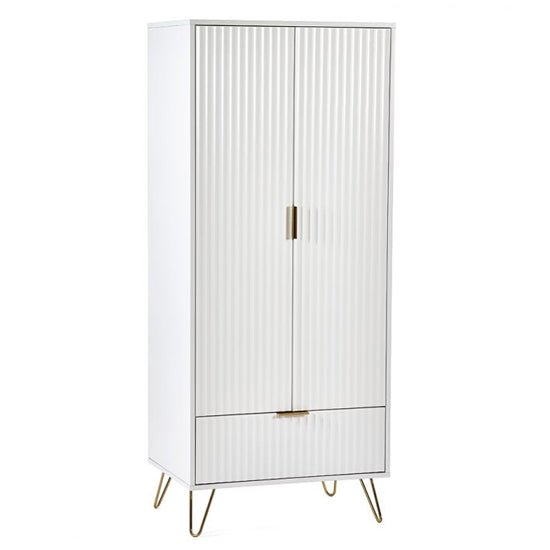 Matt white fluted wardrobe with gold legs and drawer
