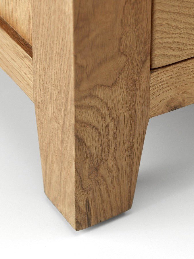 Solid oak wardrobe leg detail from CHOICEWARDROBE Marlborough range with natural waxed finish.