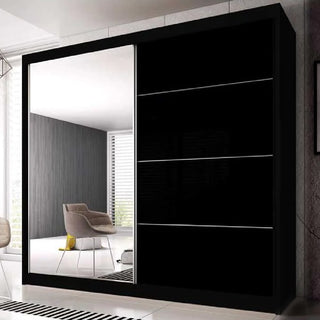 The CHOICEWARDROBE Mesa 2 Door Mirrored Sliding Wardrobe (183cm) features a black gloss finish, full mirror design, smooth sliding doors, and a spacious organized interior for a modern, minimalist bedroom look.