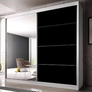 The CHOICEWARDROBE Mesa 2 Door Mirrored Sliding Wardrobe (203cm, White & Black) features full mirror sliding doors and spacious storage, reflecting a chair and window blinds in a modern bedroom setting.