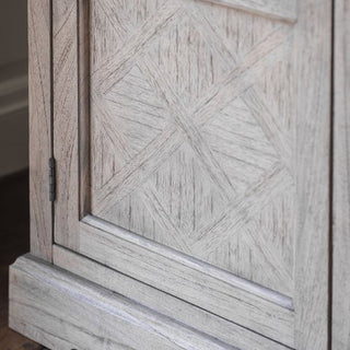 Close-up of the CHOICEWARDROBE Mestiza 2 Door Wooden Wardrobe (111.5cm), featuring a rustic mirrored design, carved detailing, and a solid rectangular frame in a natural finish. Hinge is visible on the left door.