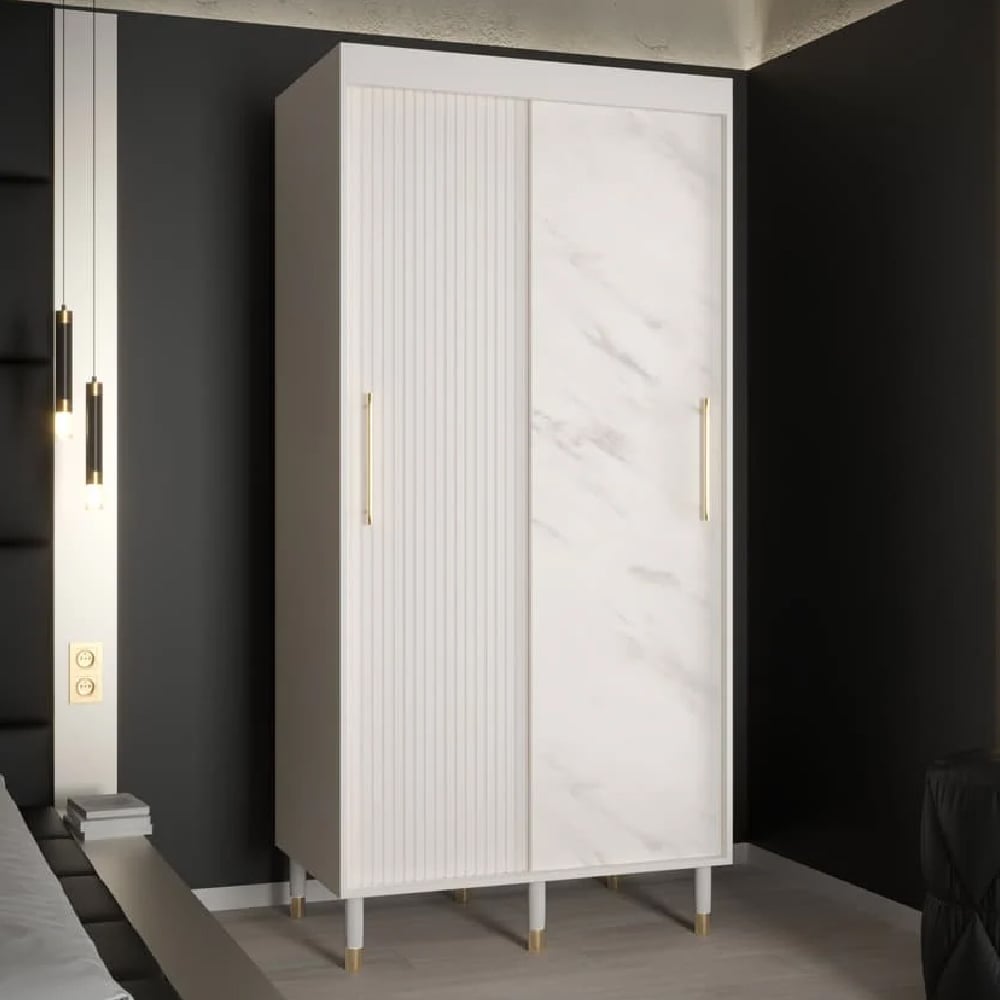White marble-effect sliding wardrobe with ribbed panels and gold handles
