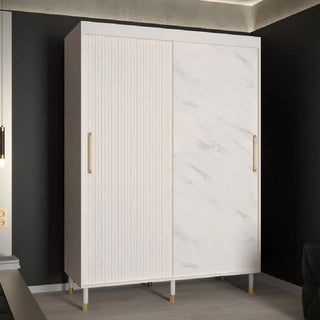 The CHOICEWARDROBE Millwall 150cm White Marble Effect Sliding Wardrobe features ribbed panels, one marble-look door, gold handles, and a compact luxury design, standing out in a dark-walled room.