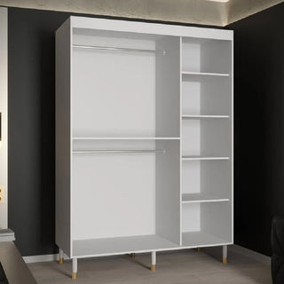 The CHOICEWARDROBE Millwall 150cm White Marble Effect 2 Door Sliding Wardrobe features ribbed panels, gold handles, and a compact luxury design, ideal for a modern room with black and white walls and a wooden floor.
