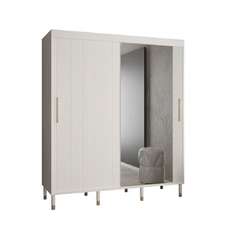 The CHOICEWARDROBE Millwall 180cm White Mirrored 2 Door Sliding Wardrobe features a ribbed panel design, one mirrored door, gold handles, and a modern luxury finish for stylish, space-saving bedroom storage.