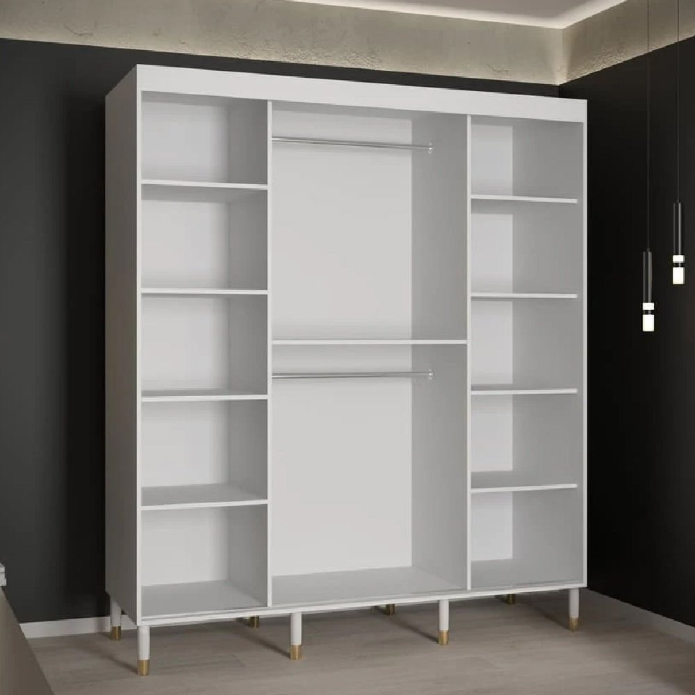 White sliding wardrobe with ribbed panels, gold handles and 2 doors.