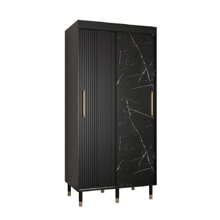 The CHOICEWARDROBE Millwall 2 Door Wardrobe (100cm) combines a black marble finish with white veining and a ribbed door, accented by long gold handles and modern legs, offering luxe bedroom storage with shelves and a hanging rail.