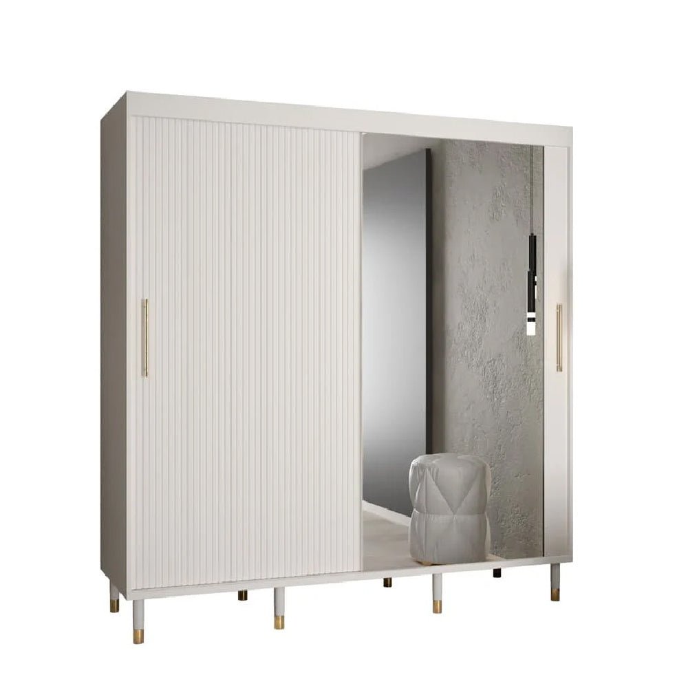 White 2-door sliding wardrobe with mirrored panel, ribbed design, and gold handles.