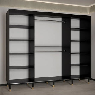 The CHOICEWARDROBE Millwall 250cm Black Wooden Sliding Door Wardrobe features a fluted panel design with gold handles and a grand luxury storage system, perfectly complementing light-colored floors and beige walls.