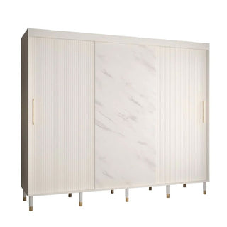 The CHOICEWARDROBE Millwall 250cm White Marble Effect Sliding Door Wardrobe features gold handles, ribbed panels, and a luxury modern design—offering elegant and stylish storage for your bedroom.