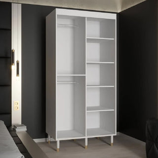 The CHOICEWARDROBE Millwall Mirrored Sliding Door Wardrobe in white with gold handles and ribbed detailing features two left hanging rods and four right open shelves, standing on six legs for compact storage in modern bedrooms.